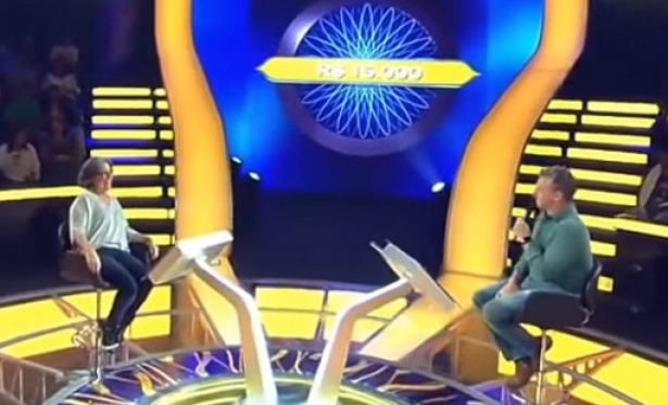 Ministra corrige Luciano Huck na TV: “Não, não sou carola. Eu sou cristã católica”